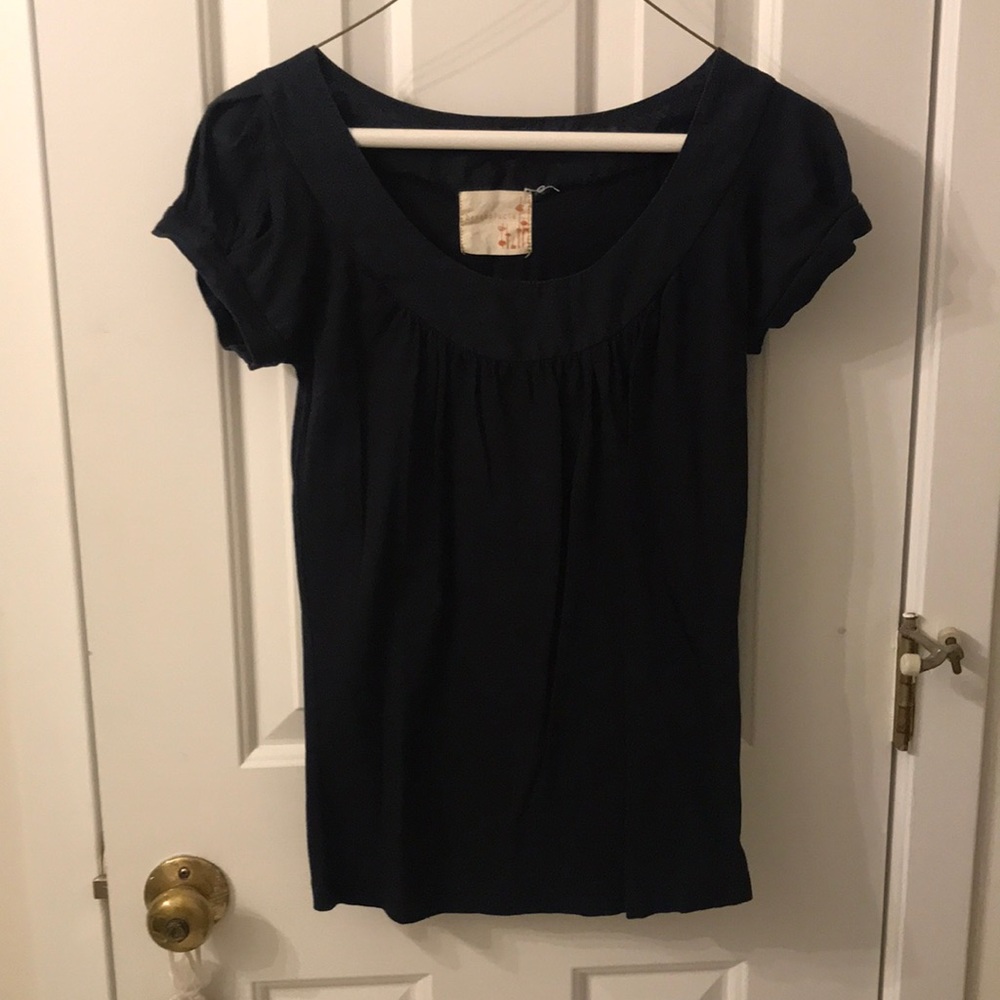 Ben and Lucia. Black blouse. Worn but no evidence of wear and tear.